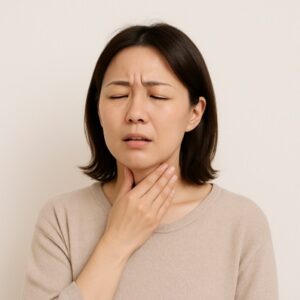 ニンバス株感染で喉が痛い女性